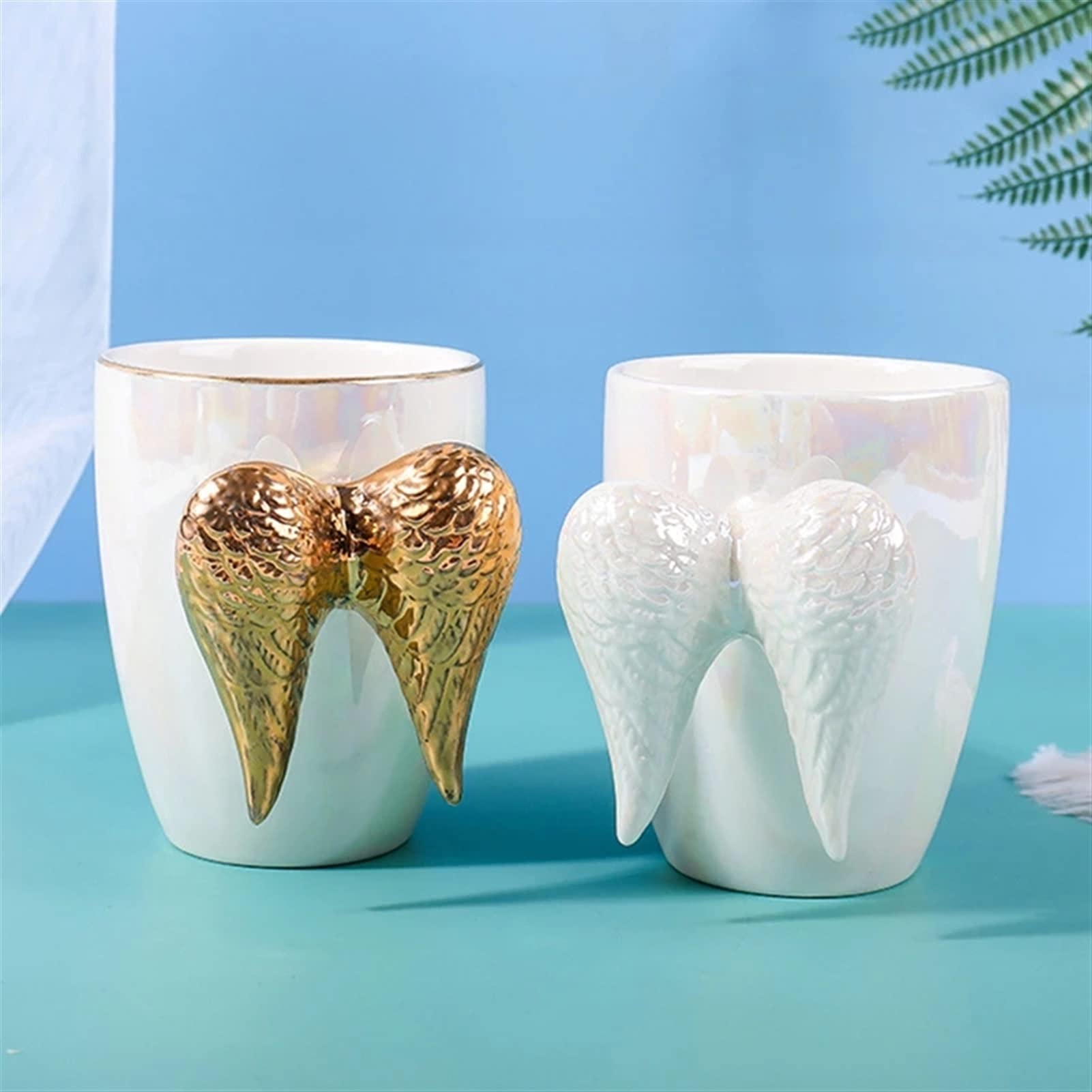 Amazon｜380MLマグカップ、天使の羽セラミック形のハンドルマグティー